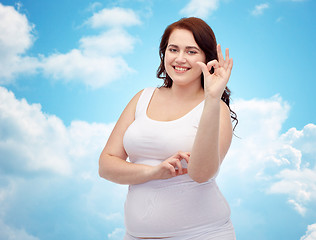 Image showing plus size woman in underwear showing ok hand sign