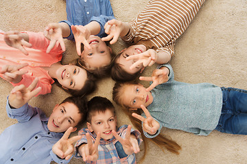 Image showing happy children showing peace hand sign