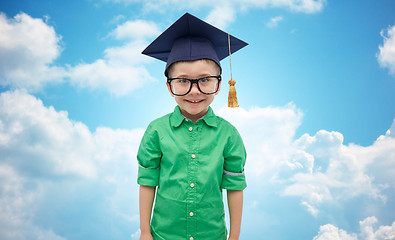 Image showing happy boy in bachelor hat or mortarboard