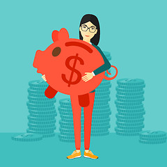 Image showing Woman carrying piggy bank.