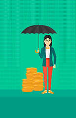 Image showing Woman with umbrella protecting money.