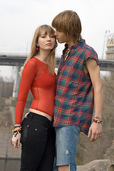 Image showing Young couple - the guy and the girl outdoor 7