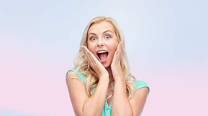 Image showing surprised smiling young woman or teenage girl