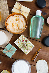 Image showing close up of body care cosmetic products on wood