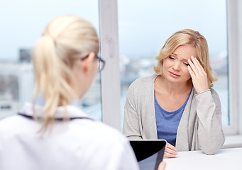 Image showing doctor with tablet pc and ill woman at hospital