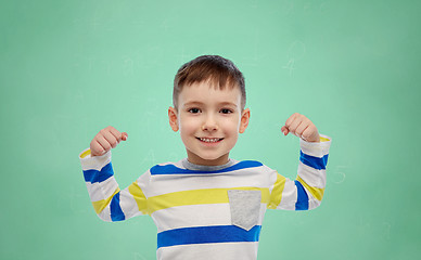 Image showing happy smiling little boy with raised hand