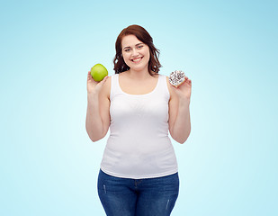 Image showing happy plus size woman choosing apple or cookie