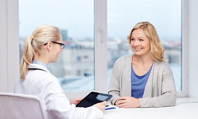 Image showing doctor with tablet pc and woman at hospital