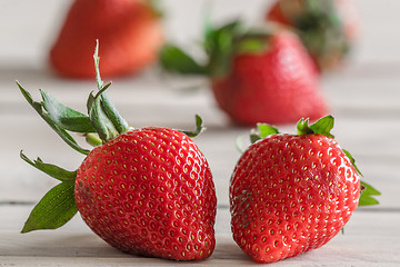 Image showing Strawberries on a wooden table