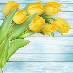 Image showing Yellow tulips flowers on wooden planks. EPS 10