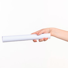 Image showing The cylinder female hands on white background