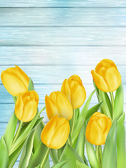 Image showing Yellow tulips flowers on wooden planks. EPS 10