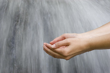 Image showing Hands scooping water