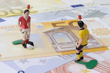 Image showing Figures of football players on banknotes