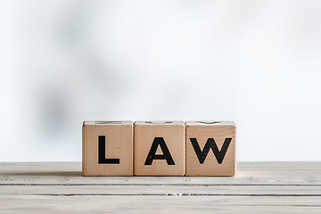 Image showing Law sign on a wooden desk