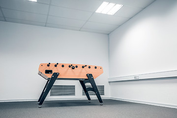 Image showing Foosball table in a large room