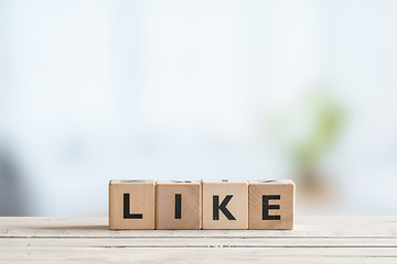 Image showing Like message on a wooden desk