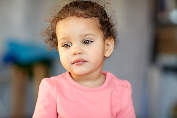 Image showing beautiful little mulatto baby girl face