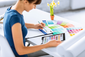 Image showing woman working with color samples for selection