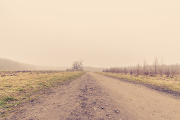 Image showing Countryside road in misty weather