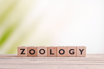 Image showing Zoology lesson sign on a table