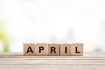 Image showing April sign with wooden cubes