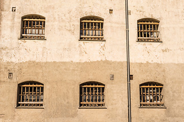 Image showing Jail wall with windows with bars