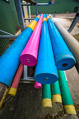 Image showing Equestrian jumping poles in various colors