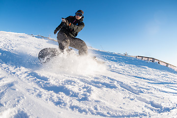 Image showing Snowboard freerider in the mountains