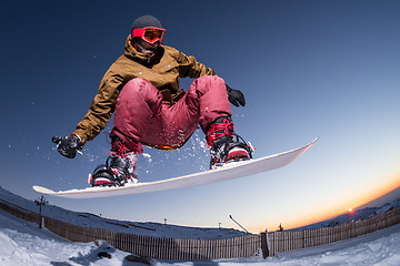 Image showing Snowboarding in the mountains