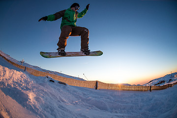 Image showing Snowboarding in the mountains