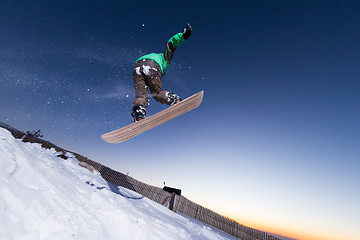 Image showing Snowboarding in the mountains