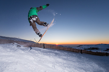 Image showing Snowboarding in the mountains