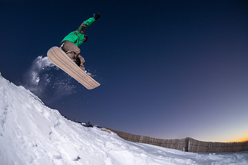 Image showing Snowboarding in the mountains