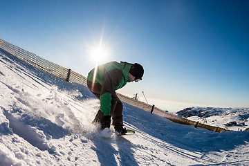 Image showing Snowboard freerider in the mountains