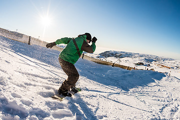 Image showing Snowboard freerider in the mountains