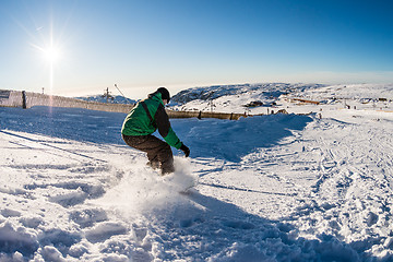 Image showing Snowboard freerider in the mountains