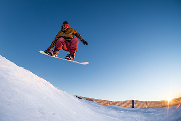 Image showing Snowboarding in the mountains