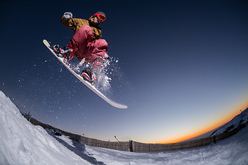 Image showing Snowboarding in the mountains