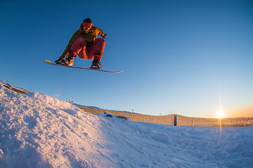 Image showing Snowboarding in the mountains