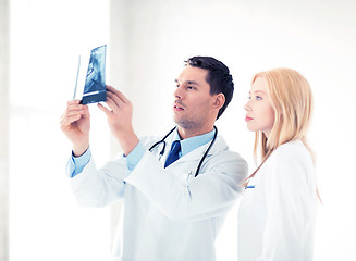 Image showing two doctors looking at x-ray