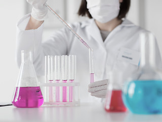 Image showing close up of scientist making test in lab