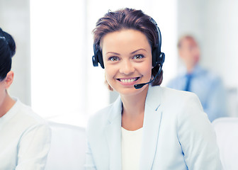 Image showing friendly female helpline operator