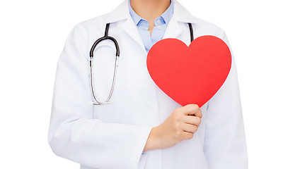 Image showing female doctor with heart and stethoscope