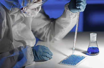 Image showing close up of scientist making test in lab