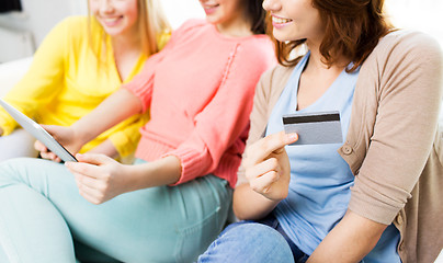 Image showing teenage girls with tablet pc and credit card