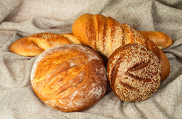 Image showing Various grades of bread in the middle of a sacking