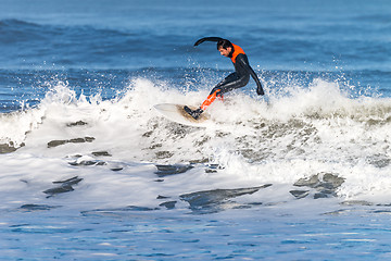 Image showing Surfing the waves