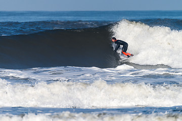 Image showing Surfing the waves