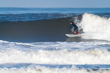 Image showing Surfing the waves